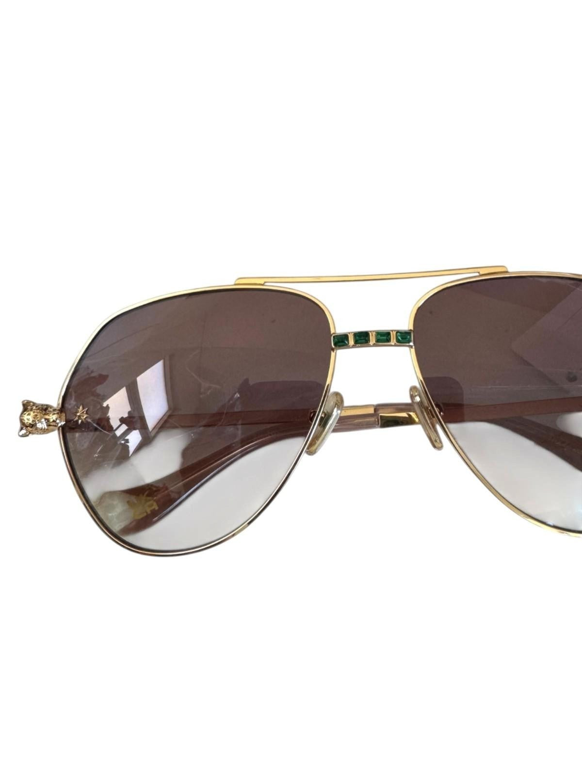 Naked Pear Camilla Nothing in Moderation gold aviator sunglasses with brown gradient lenses and green crystal bridge detail