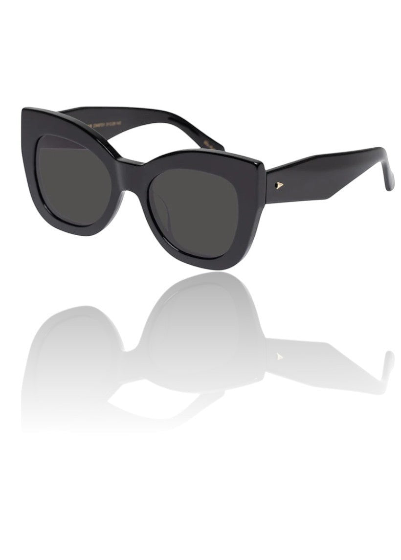 Naked Pear Karen Walker Northern Lights cat eye sunglasses in black acetate with grey mono lenses and gold hardware.
