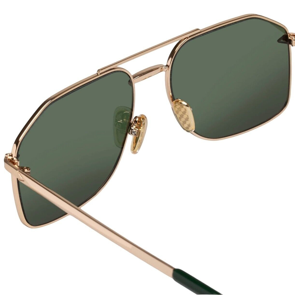 Naked Pear Karen Walker Pampel aviator sunglasses featuring polished gold frames and grass-green lenses.