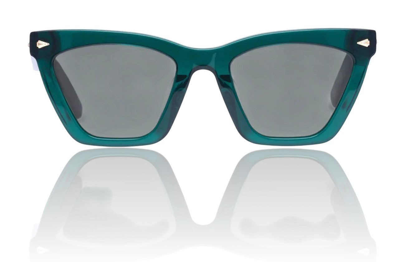Naked Pear Karen Walker Spellbound emerald green acetate cat-eye sunglasses with gold arrow hardware and green lenses.