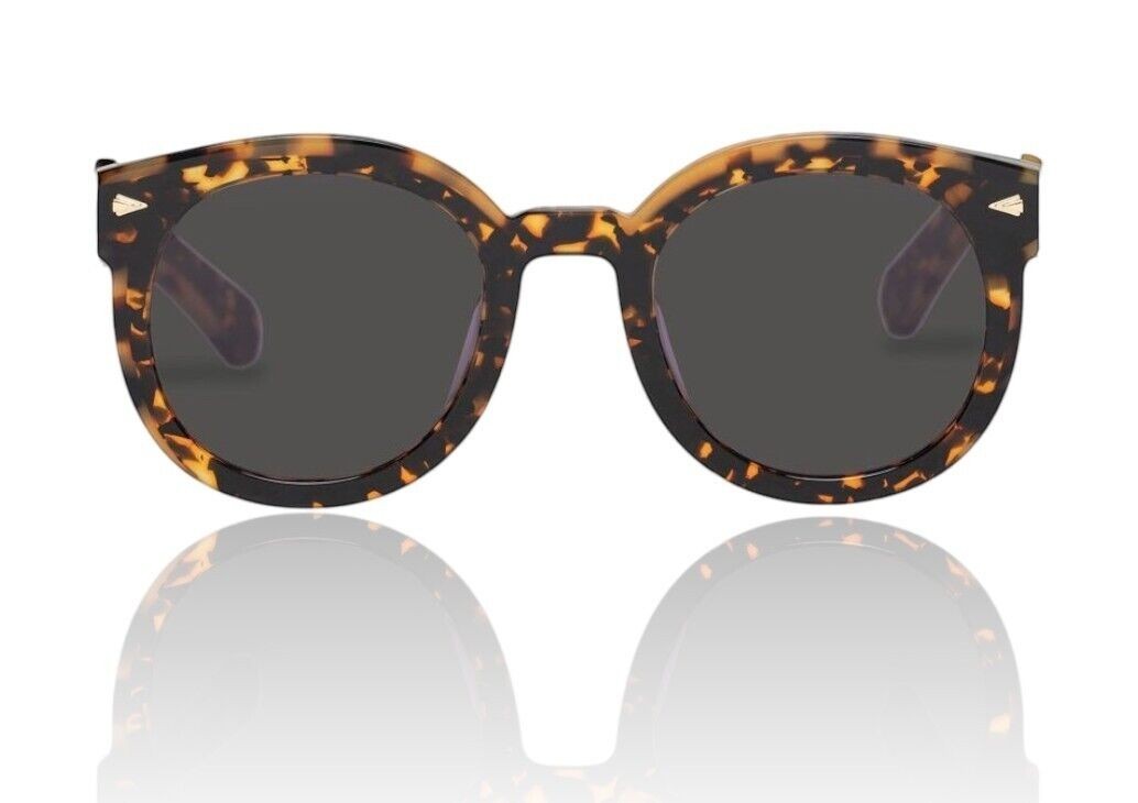 Naked Pear Karen Walker Super Wavy Duper sunglasses in tortoise shell with round frames and dark smoke mono lenses.