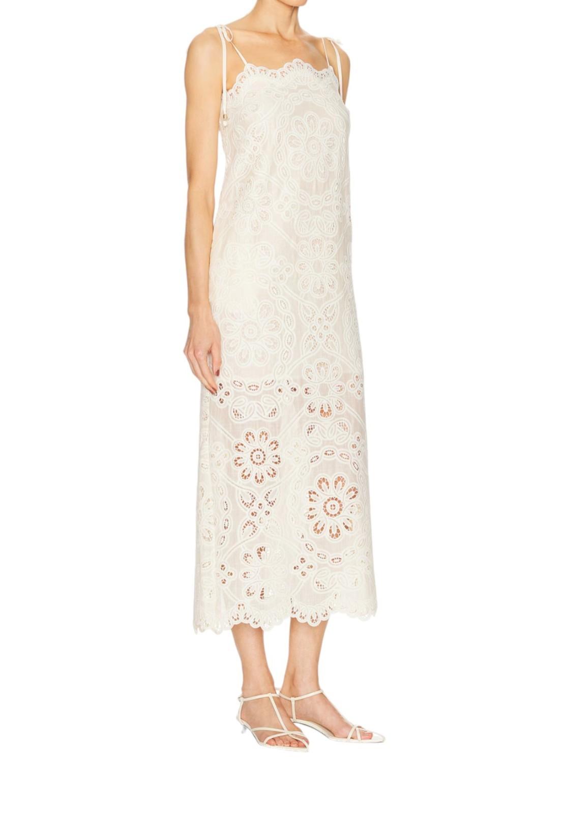 White lace dress with floral patterns on a white background