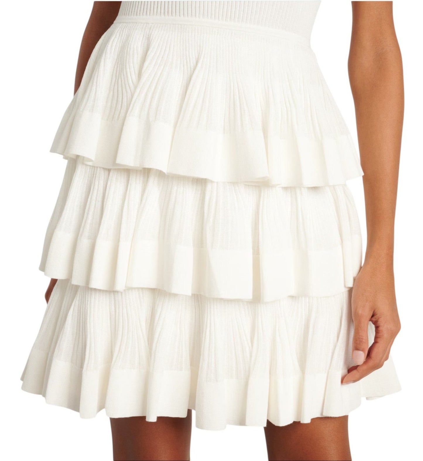 Naked Pear Zimmermann Crush cream knitted mini dress featuring a ribbed bodice and tiered ruffled skirt.
