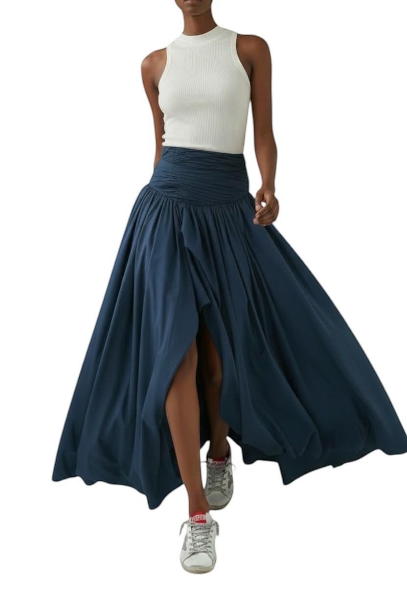AI generated image of Naked Pear Aje Violette slate blue cotton maxi skirt with ruched waist, asymmetric bubble hem, and front slit.