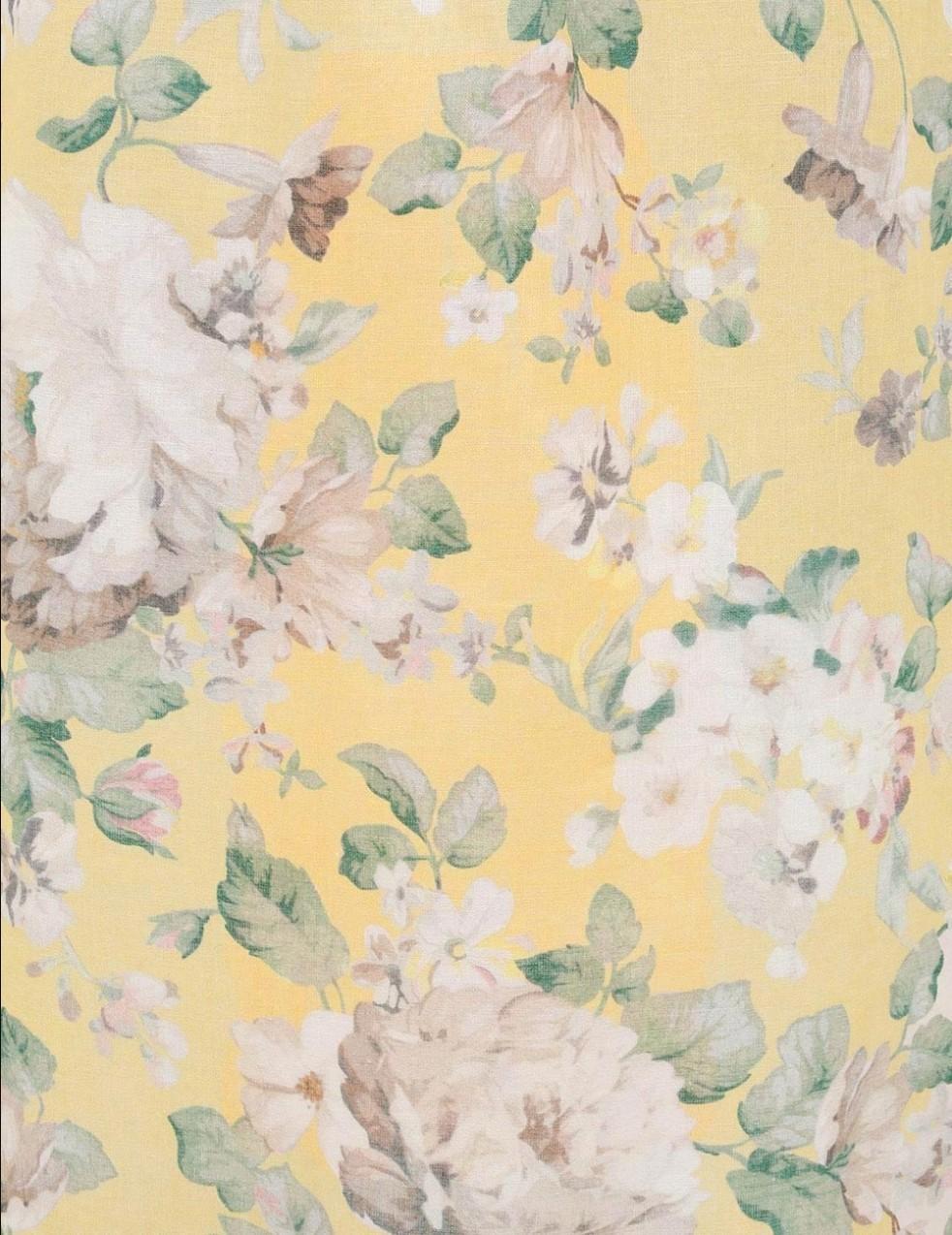 Floral pattern with white flowers and green leaves on a yellow background