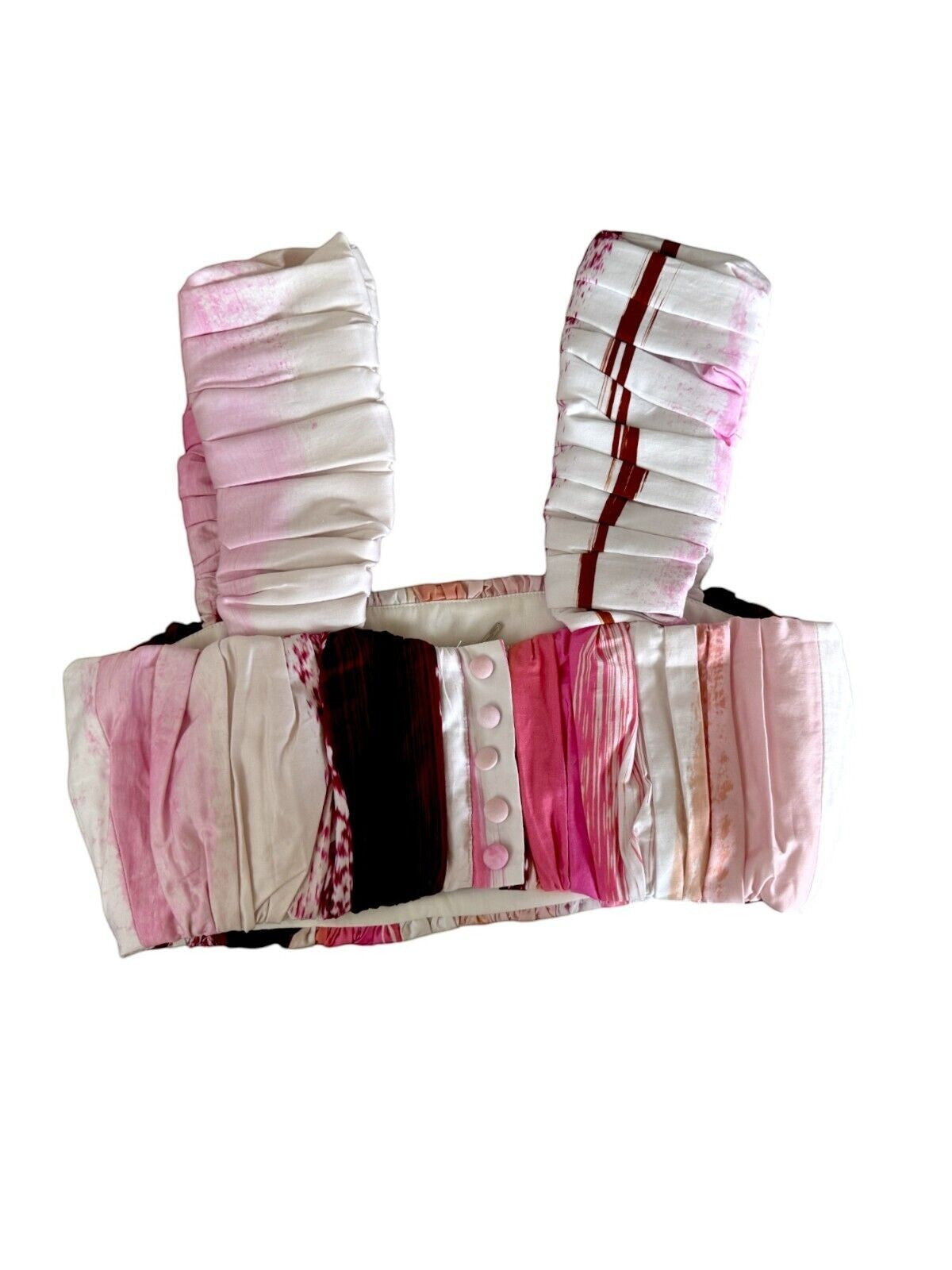 Naked Pear AJE Kasbah cotton crop top in pink, burgundy, and white with ruched wide straps and button detail.