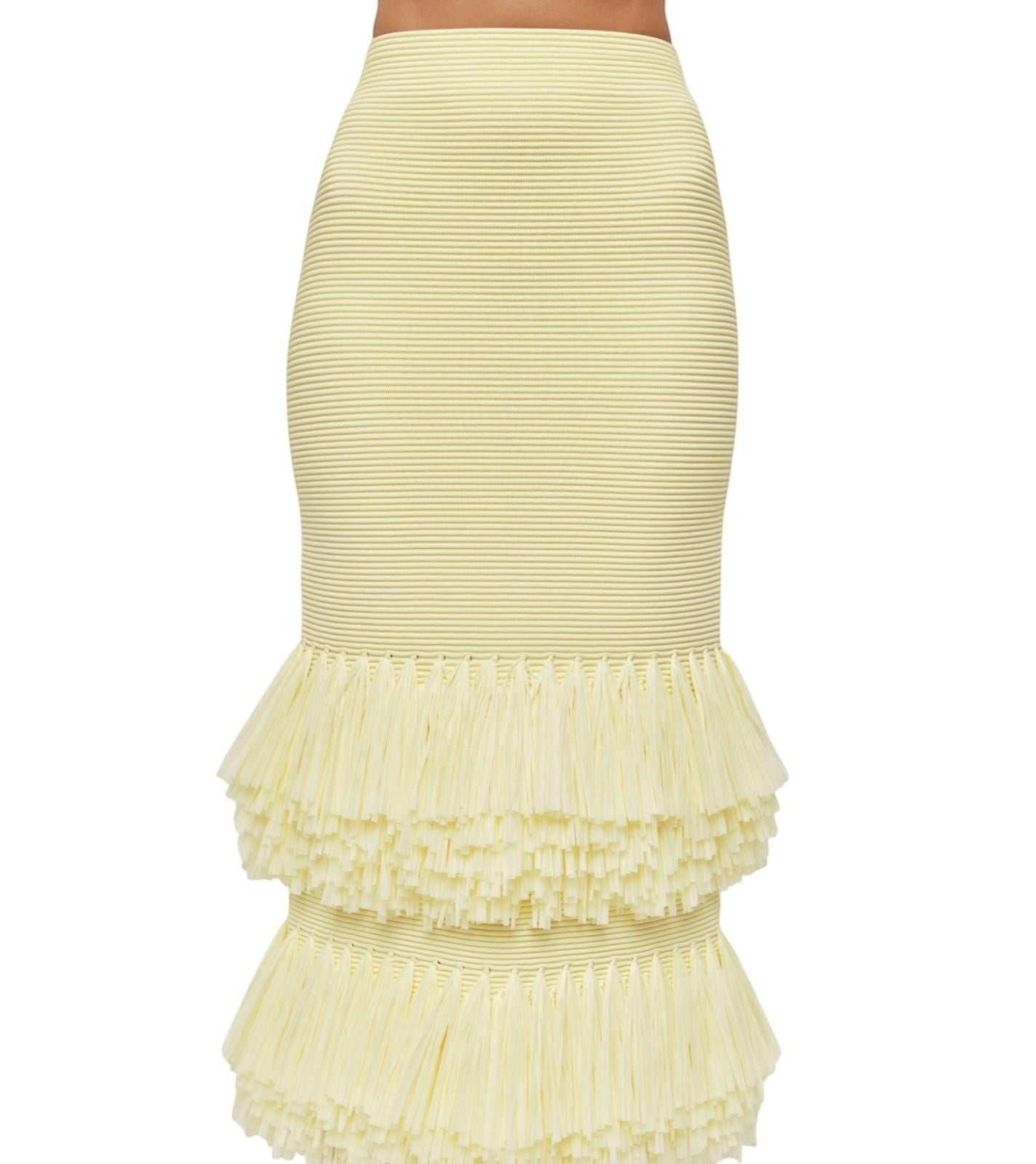 Naked Pear Aje lemon yellow ribbed knit midi skirt featuring a high waist and double-layer raffia fringe hem detail.