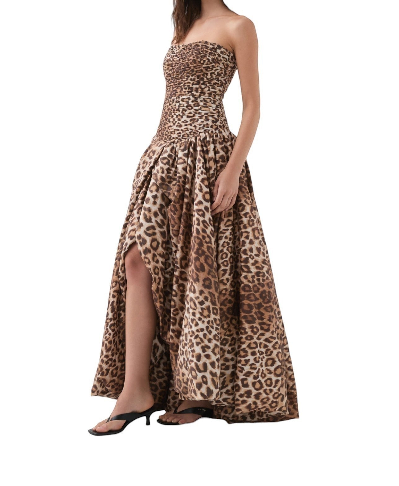 Naked Pear Aje Behold strapless leopard print maxi dress with a ruched bodice and asymmetrical high-low bubble hem.