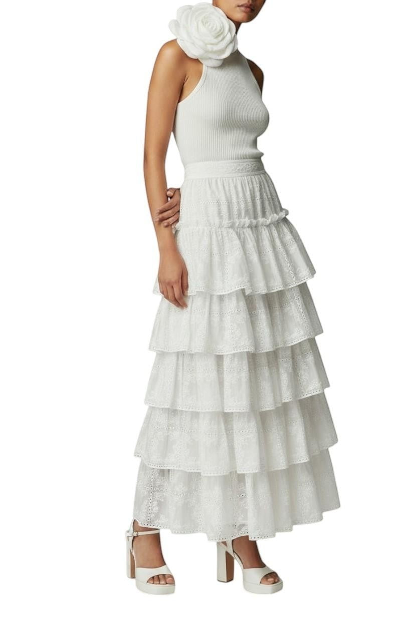 AI generated image of  Naked Pear Aje Merritt ivory embroidered Anglaise tiered midi skirt with scallop trim on a model