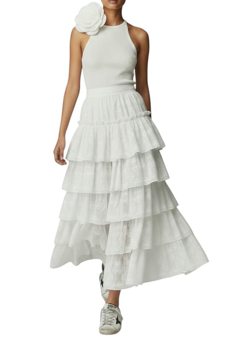 AI generated image of Naked Pear Aje Merritt ivory midi skirt featuring tiered embroidered Anglaise fabric with scallop trim and high waist.