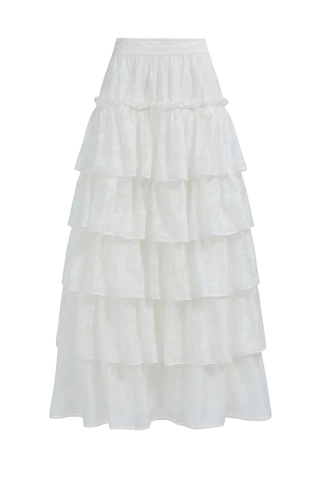 Naked Pear Aje Merritt ivory midi skirt in embroidered Anglaise cotton with tiered ruffles and scallop trim.