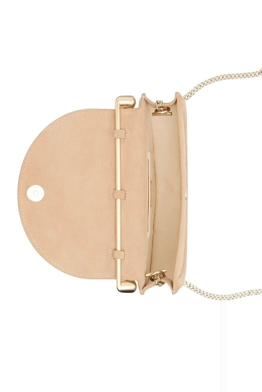 Naked Pear Aje Norma crescent crossbody bag in beige suede with a gold metal handle and detachable chain strap