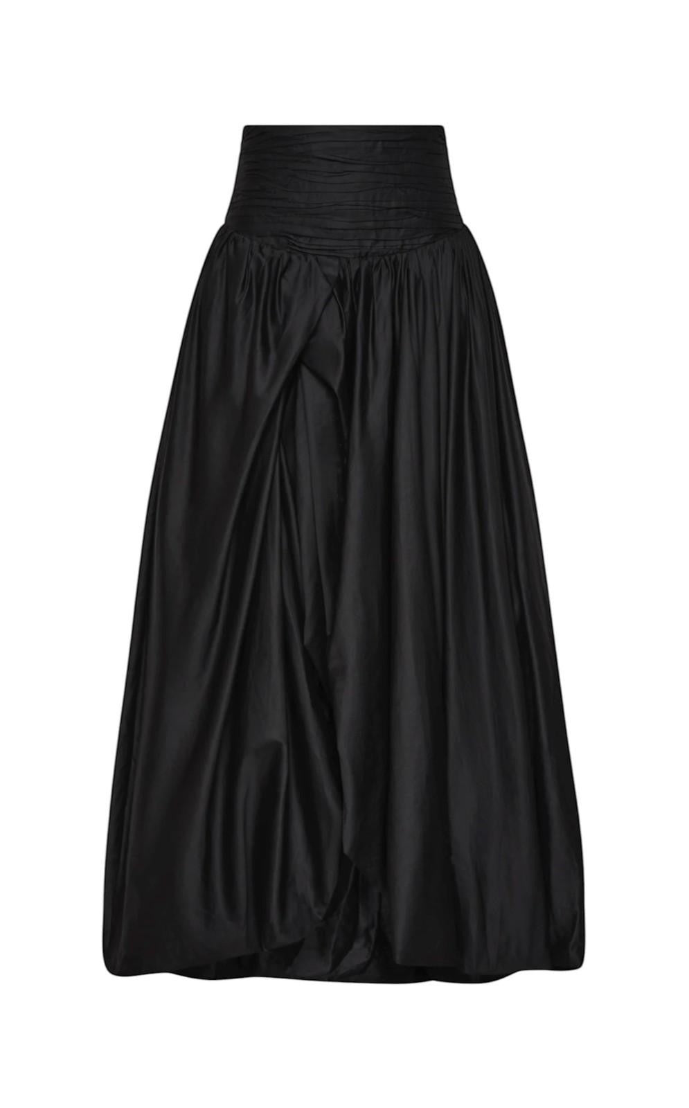 Naked Pear Aje black cotton maxi skirt featuring a ruched waistband, asymmetric draping, and a voluminous bubble hem.