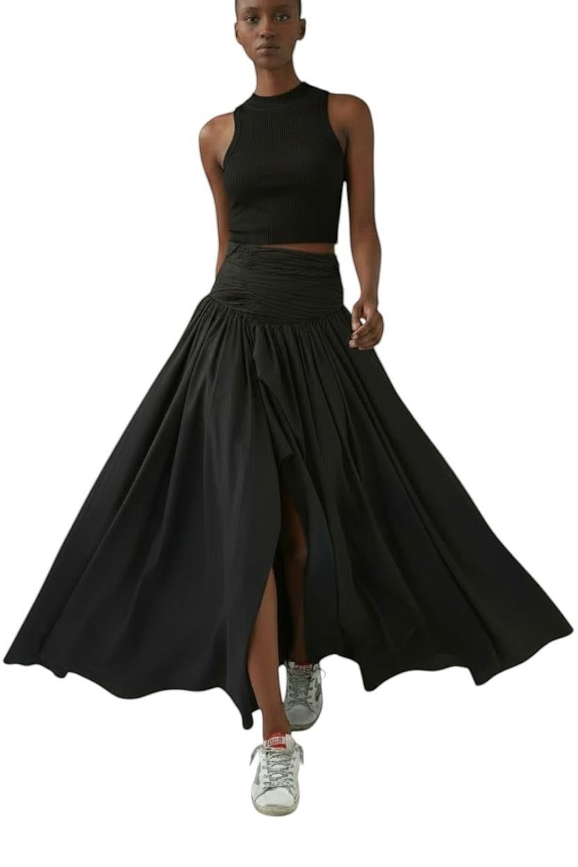 AI generated image of Naked Pear Aje black cotton maxi skirt with ruched waist, asymmetric bubble hem, and front slit worn by a model.