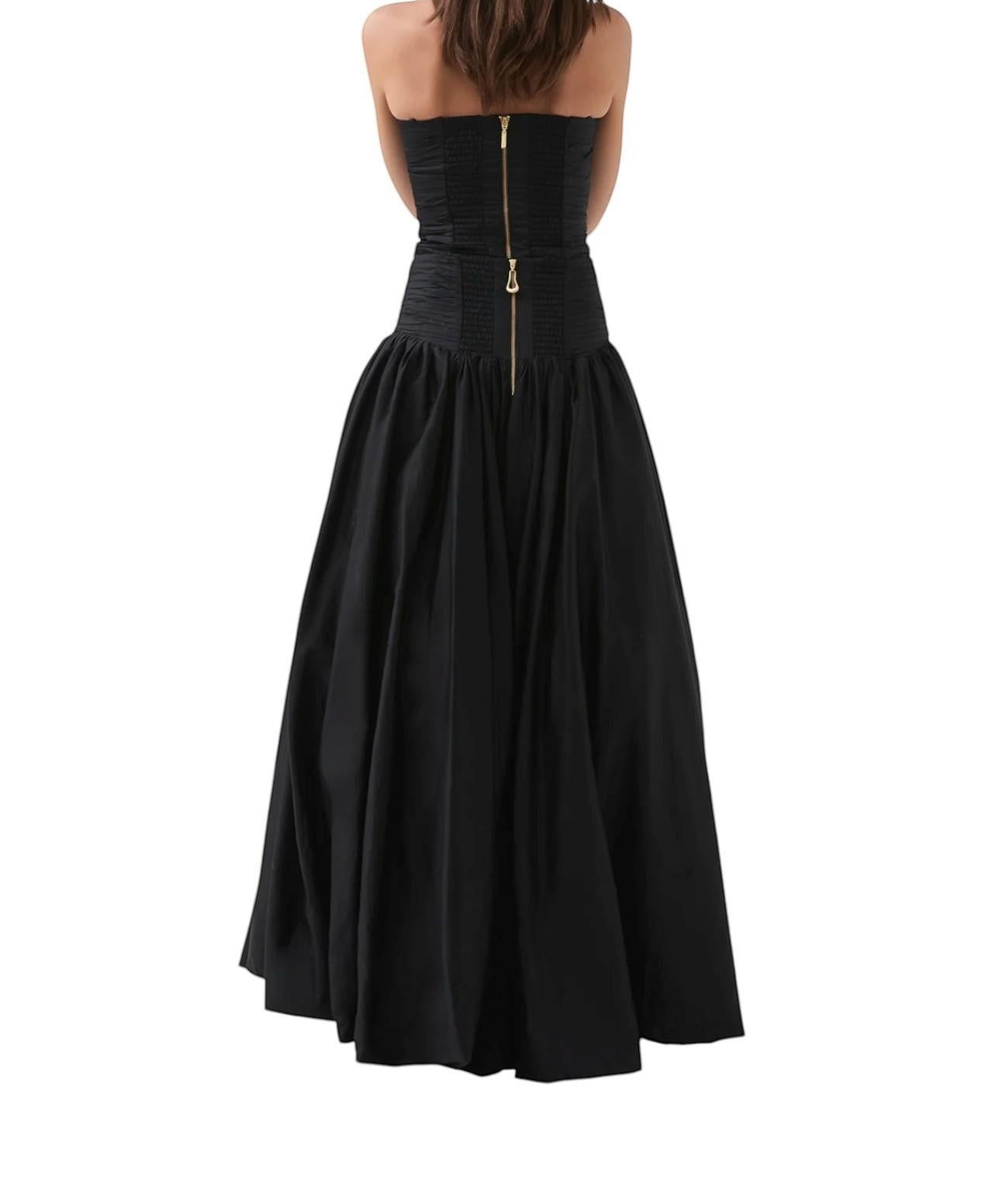 Naked Pear Aje Violette black cotton maxi skirt with ruched waist and back zip seen from the back