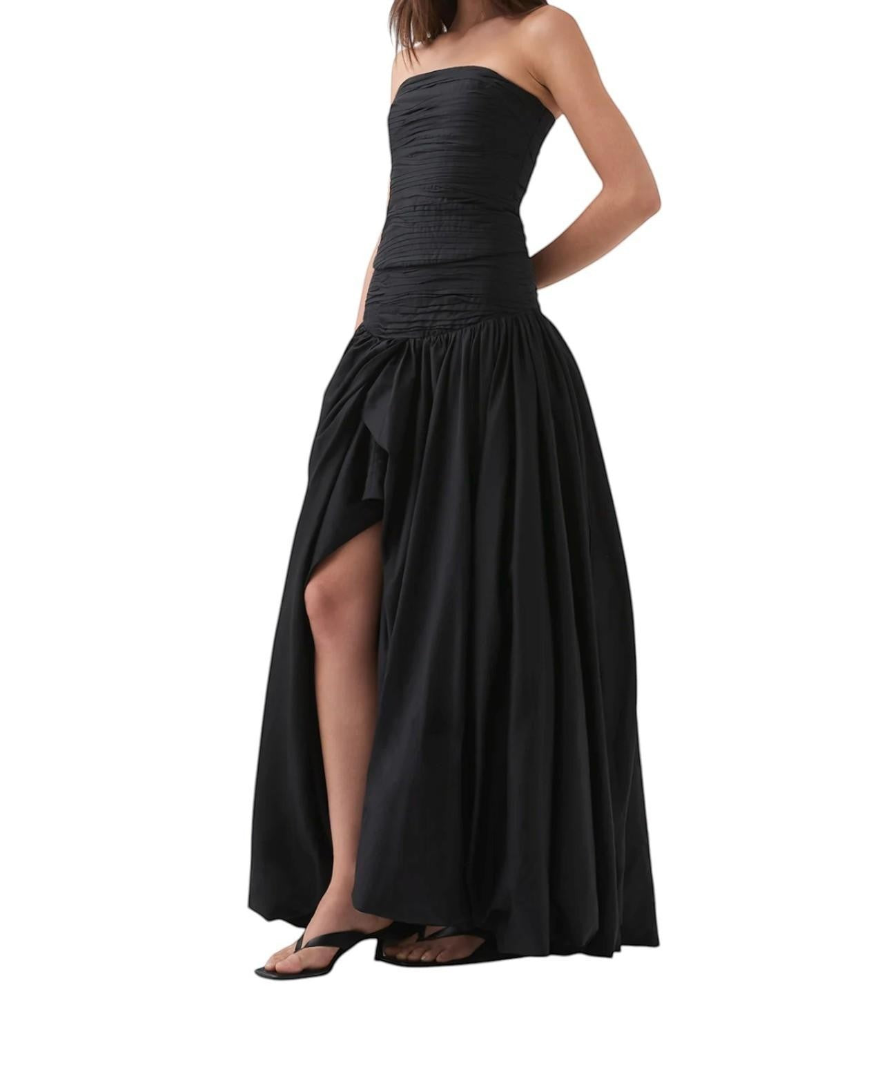 Naked Pear Aje Violette black cotton maxi skirt with ruched waist, asymmetric bubble hem, and front slit