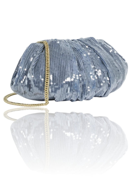 Blue sequined clutch bag with a gold strap on a white background