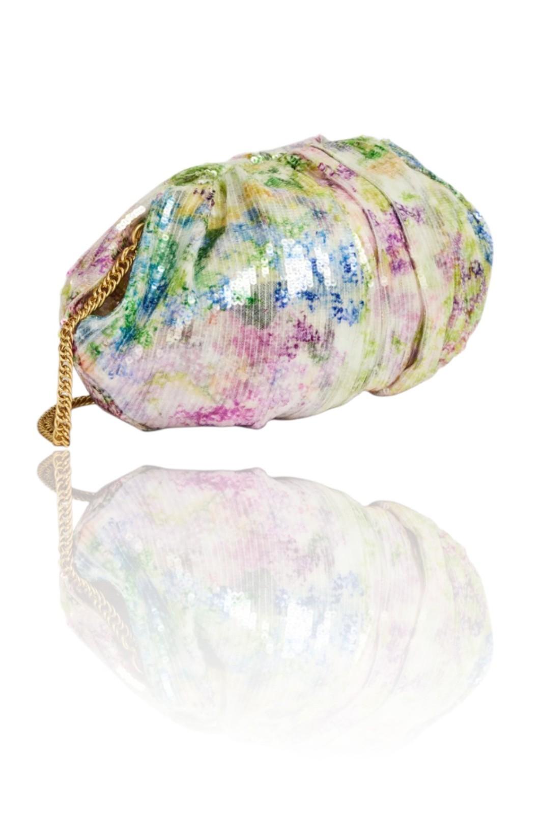 Colorful handbag with floral pattern on a white background