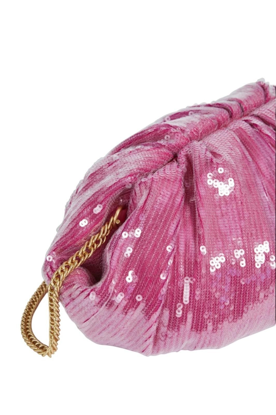 Pink sequined clutch bag with a gold chain on a white background