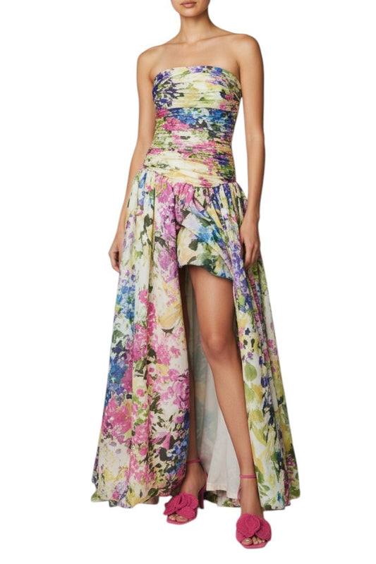 AI generated woman of Woman wearing a strapless floral dress with a high-low hem on a white background