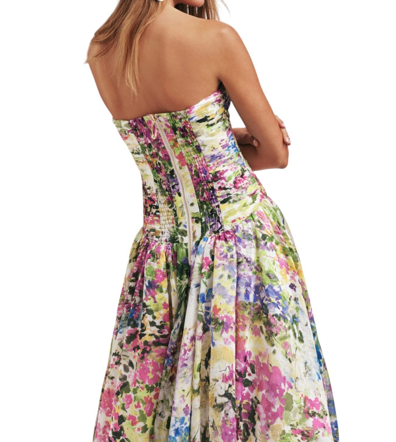 Multicolored floral strapless dress on a white background