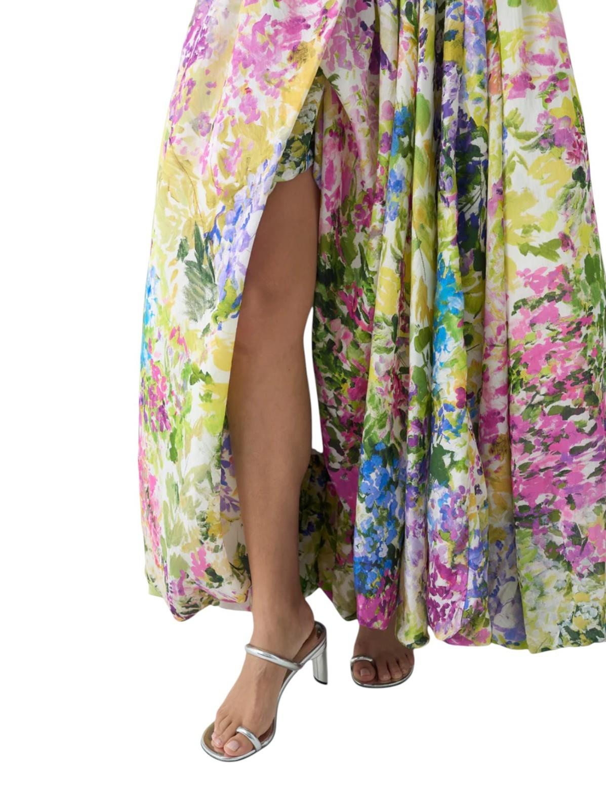 Multicolored floral dress with a slit on a white background