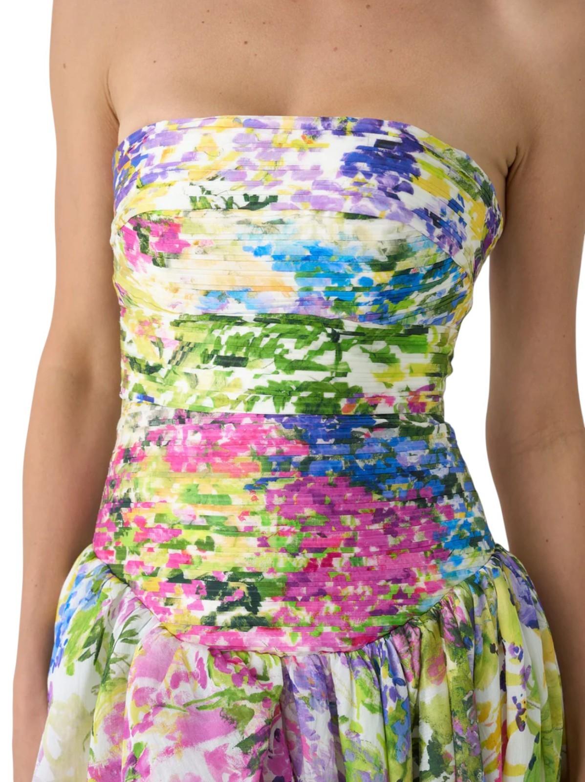 Multicolored strapless dress with floral pattern on a plain background
