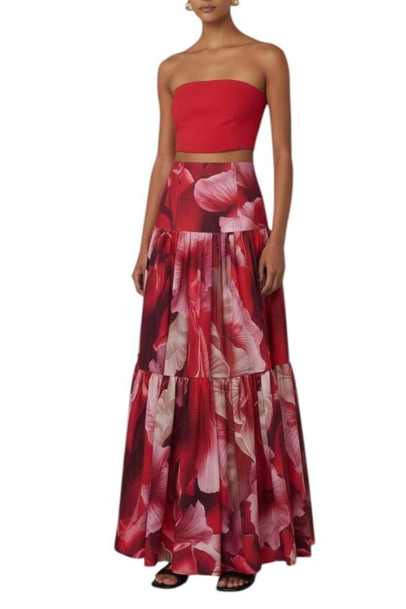 AI generated image of Woman wearing a red strapless top and floral skirt on a white background