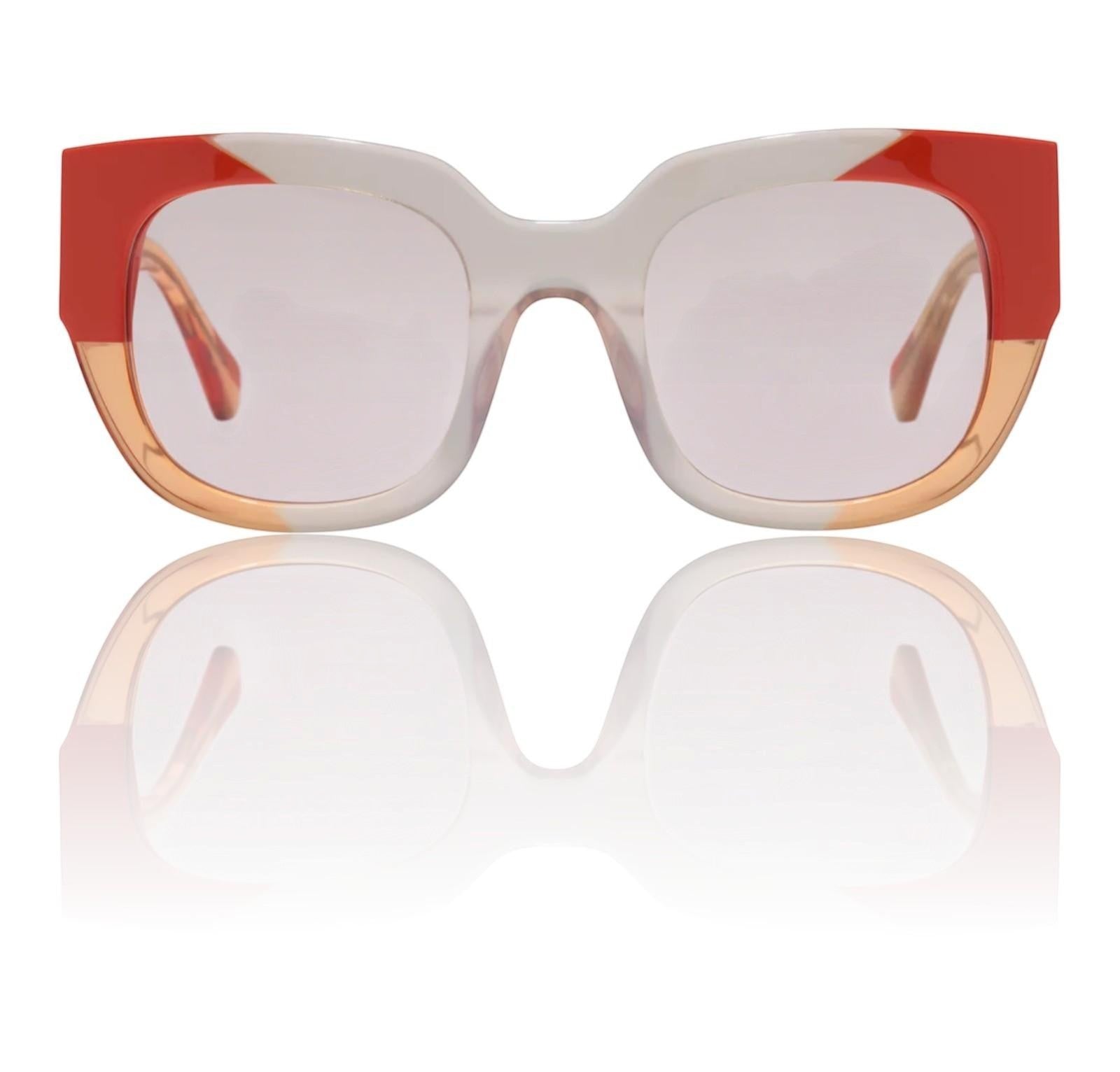 Naked Pear Camilla Decadent Dreams square sunglasses in cornsilk and tangerine acetate with amber lenses.