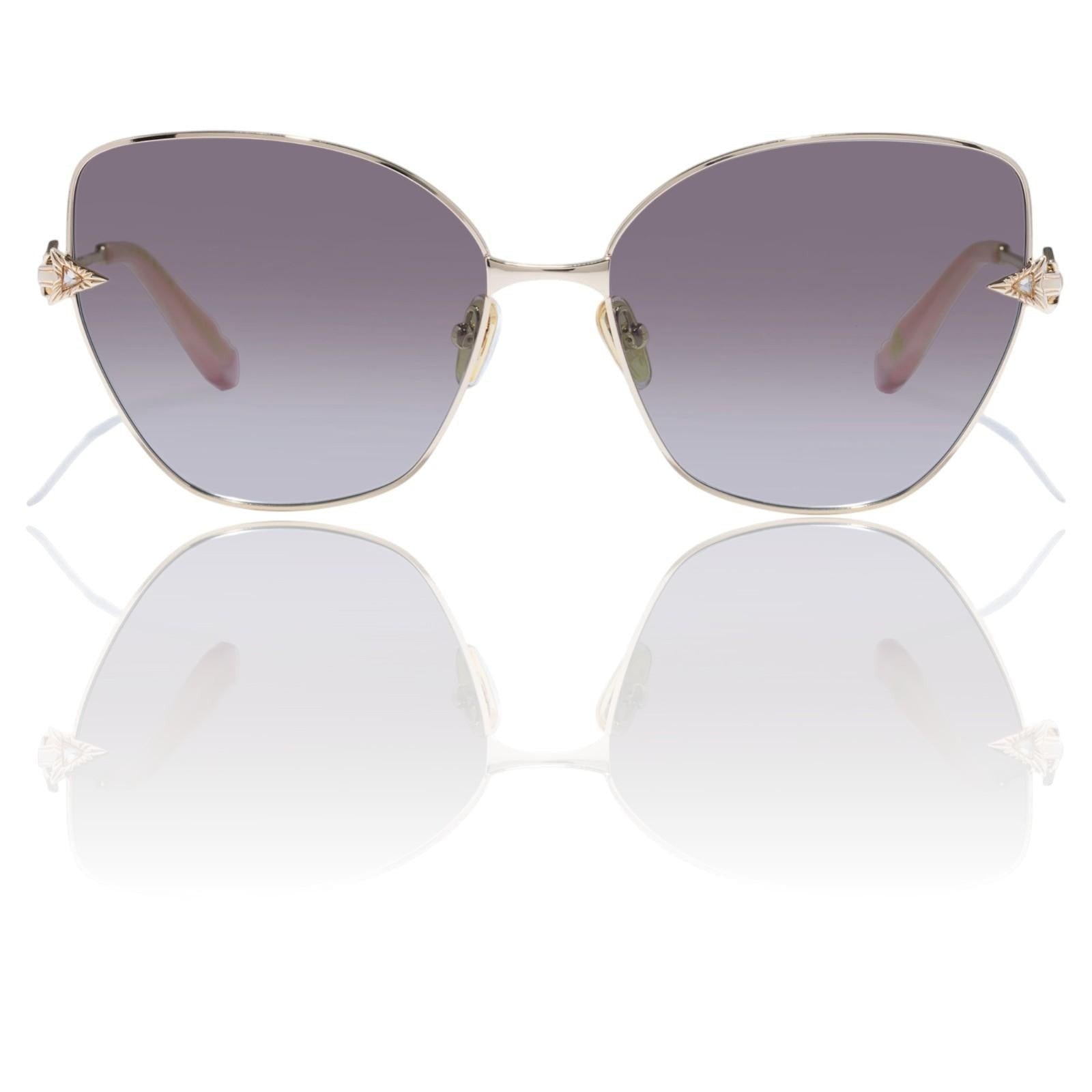 Naked Pear Camilla Desert Reign cat-eye sunglasses in gold and blush marble with grey gradient lenses and metal frames.
