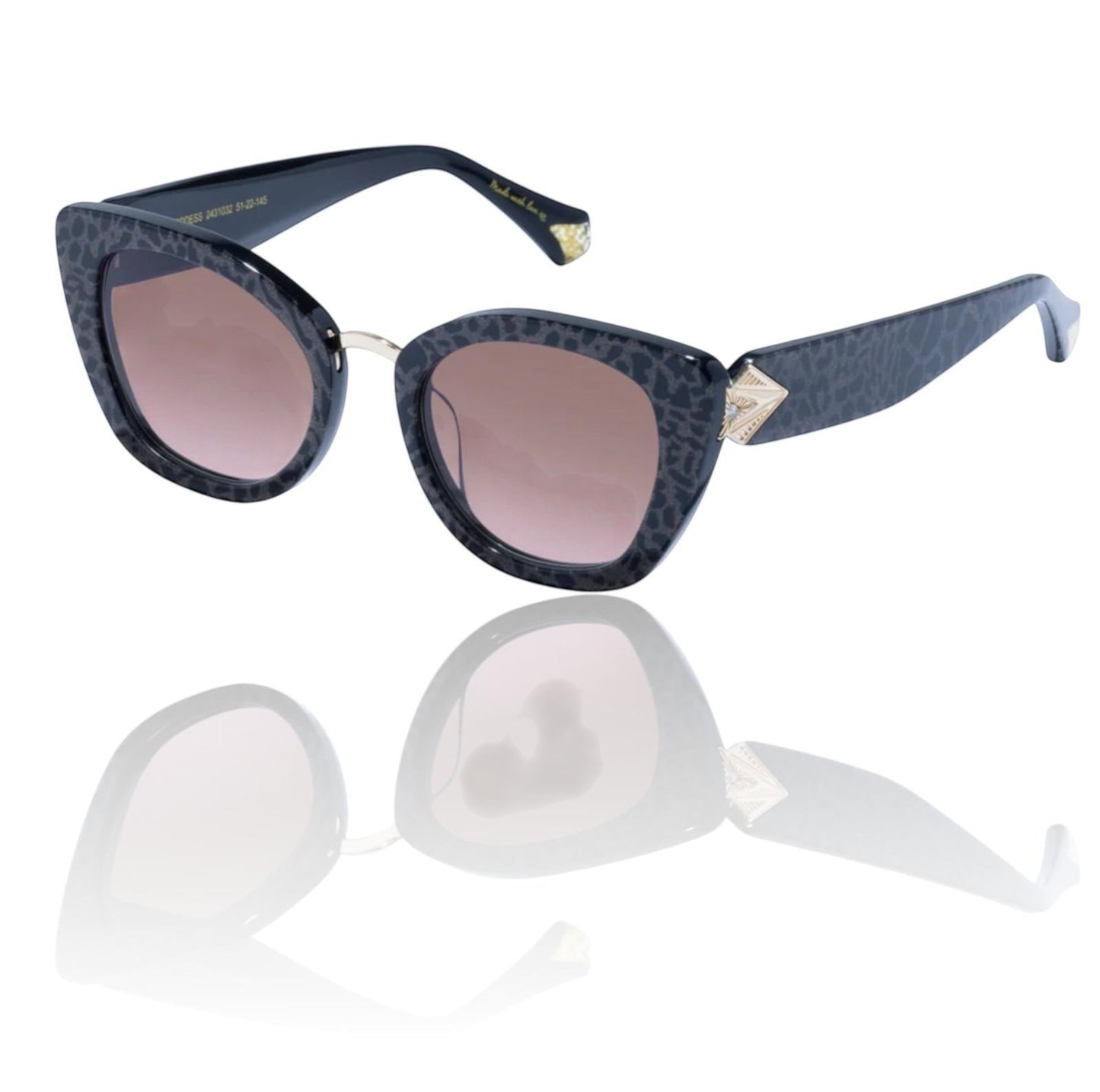 Naked Pear Camilla Nile Goddess cat eye sunglasses in black glitter leopard acetate with gold hardware and brown lenses
