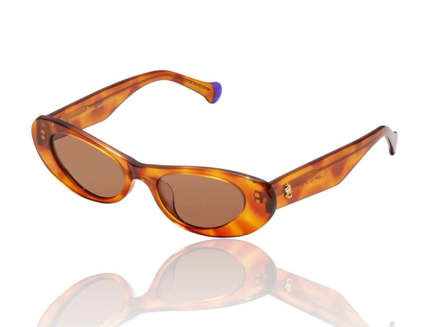 A pair of tortoise shell, cats eye-shaped sunglasses with brown lenses and gold foil details.
