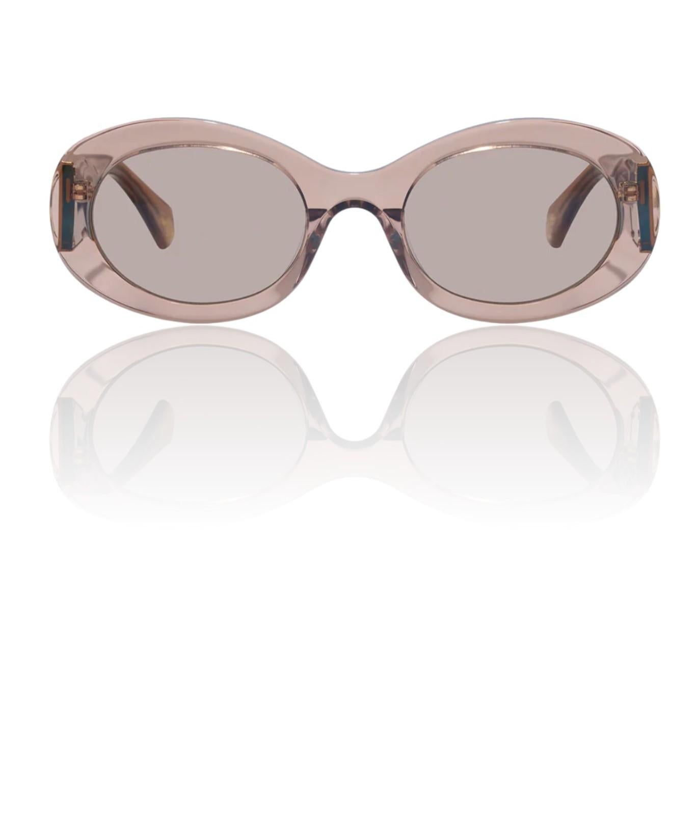 Sunglasses with a reflective surface on a white background