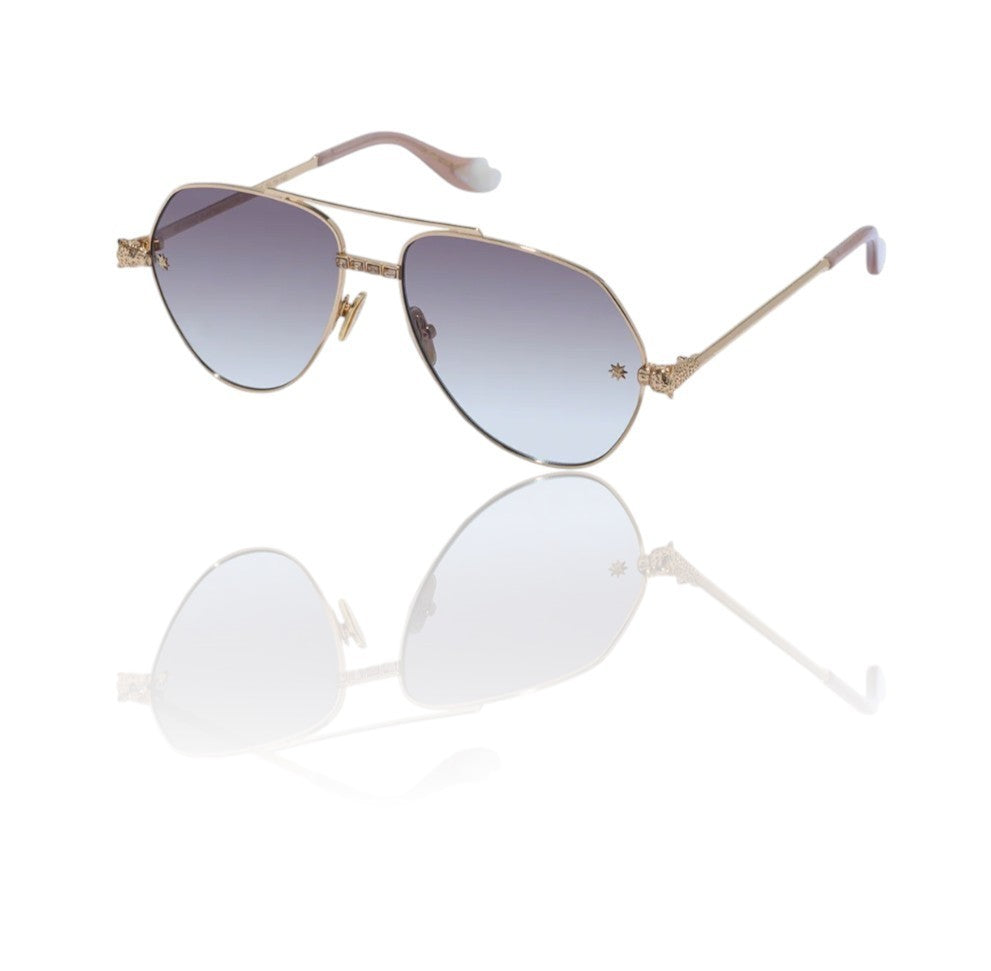 Aviator sunglasses with gold frame and gradient blue lenses on a white background
