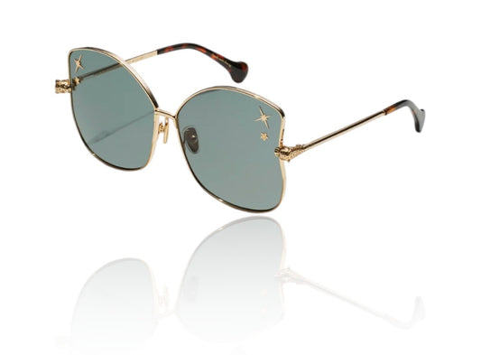 Gold-framed sunglasses with green lenses on a white background