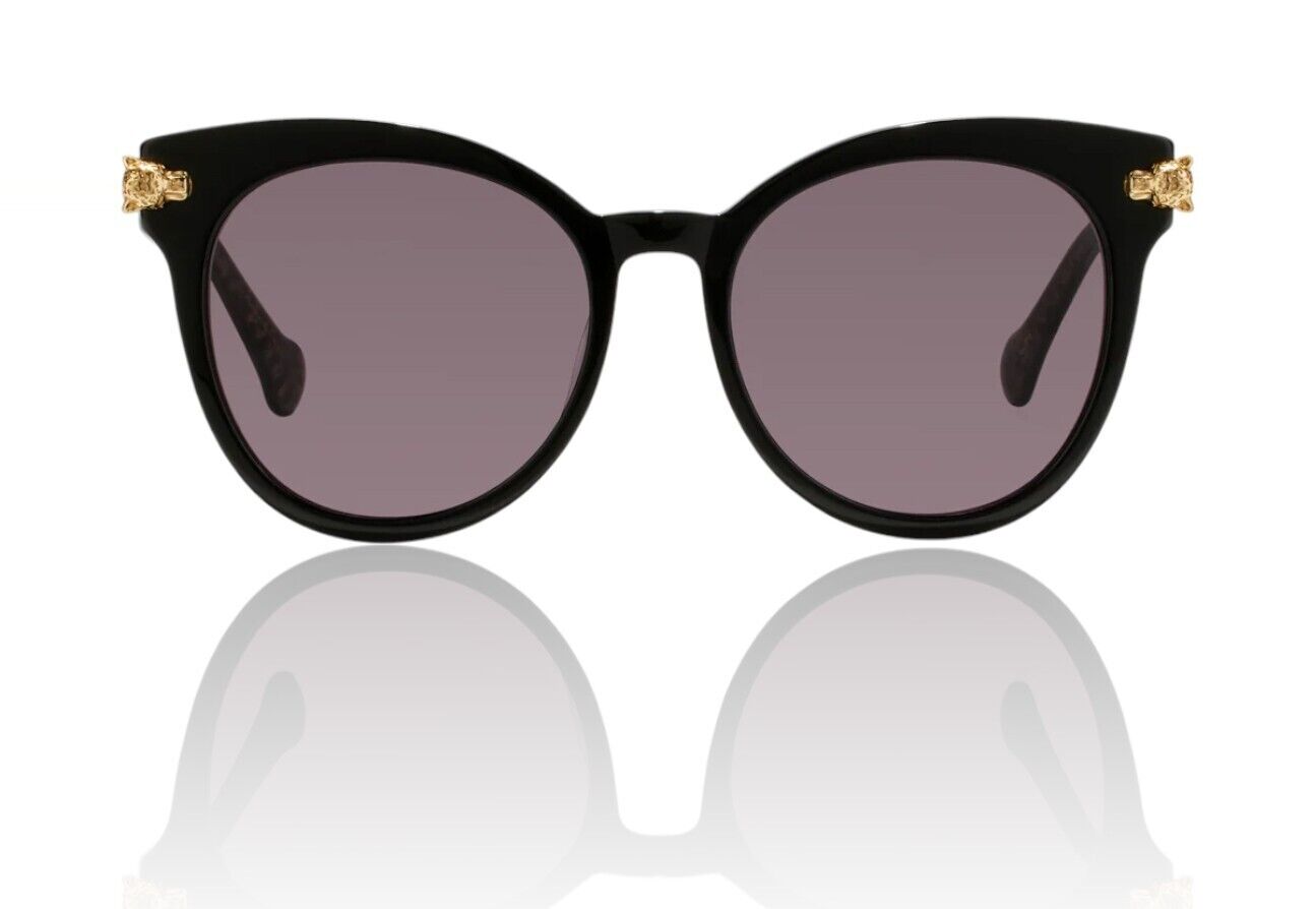 A pair of black glitter oversized cat eye sunglasses with gold leopard lug detailing on the temples.