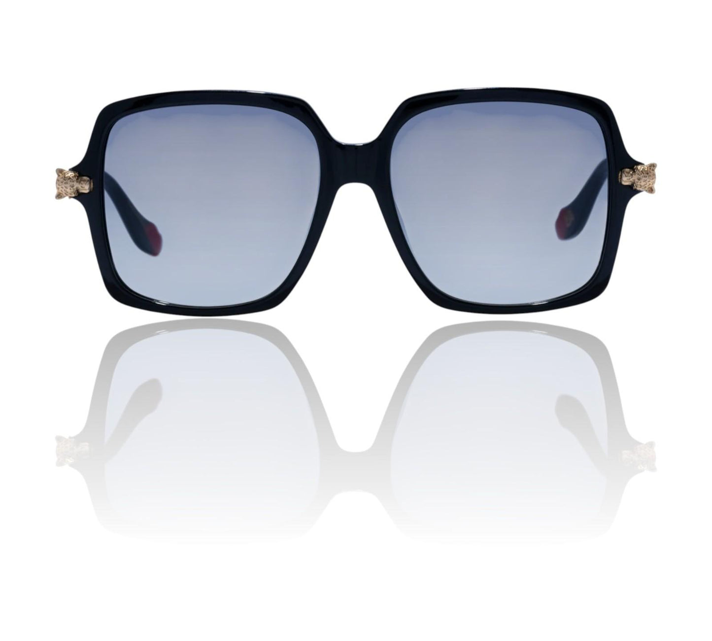 Black sunglasses with gold accents on a white background