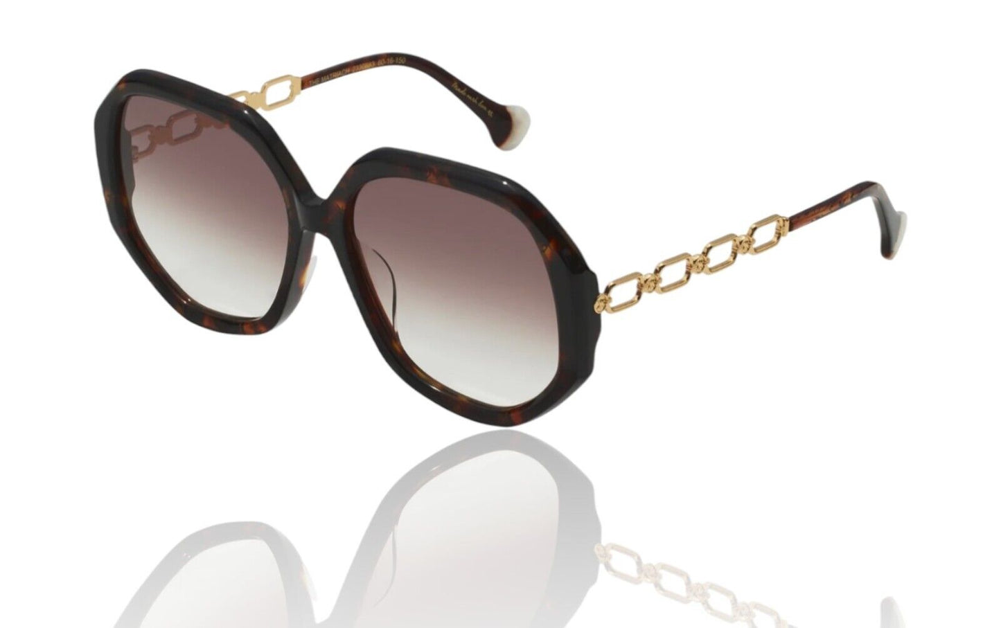 A pair of tortoise shell-patterned acetate sunglasses with gold metal chain temples and lamination detailing, featuring oversized octagonal frames.