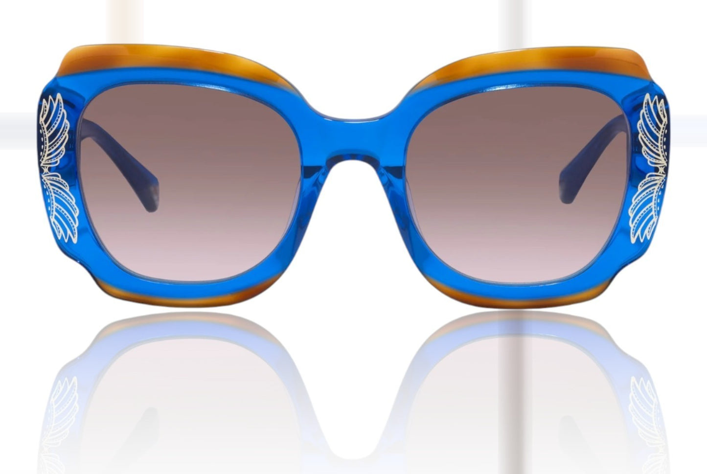 Blue sunglasses with decorative elements on a white background