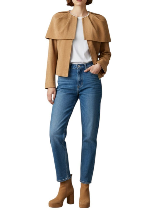 AI generated image of woman wearing a suede camel cape jacket 