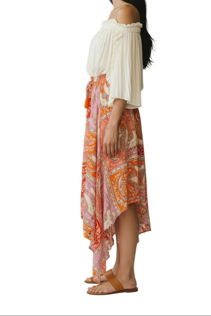 AI generated image of Woman wearing a white top and colorful patterned skirt on a white background