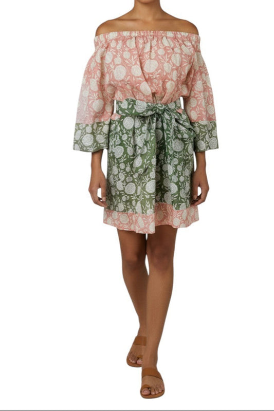 AI generated image of Woman wearing a floral off-shoulder dress with a white background