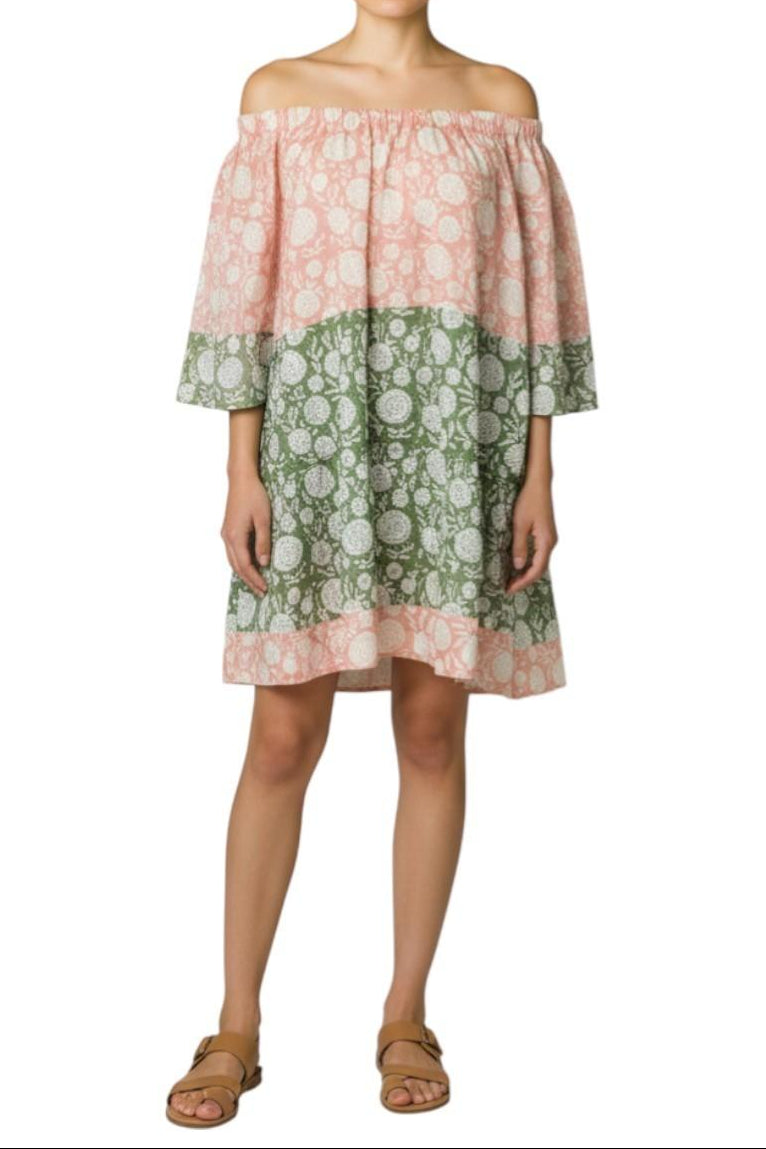 AI generated image of Woman wearing a floral off-shoulder dress on a white background