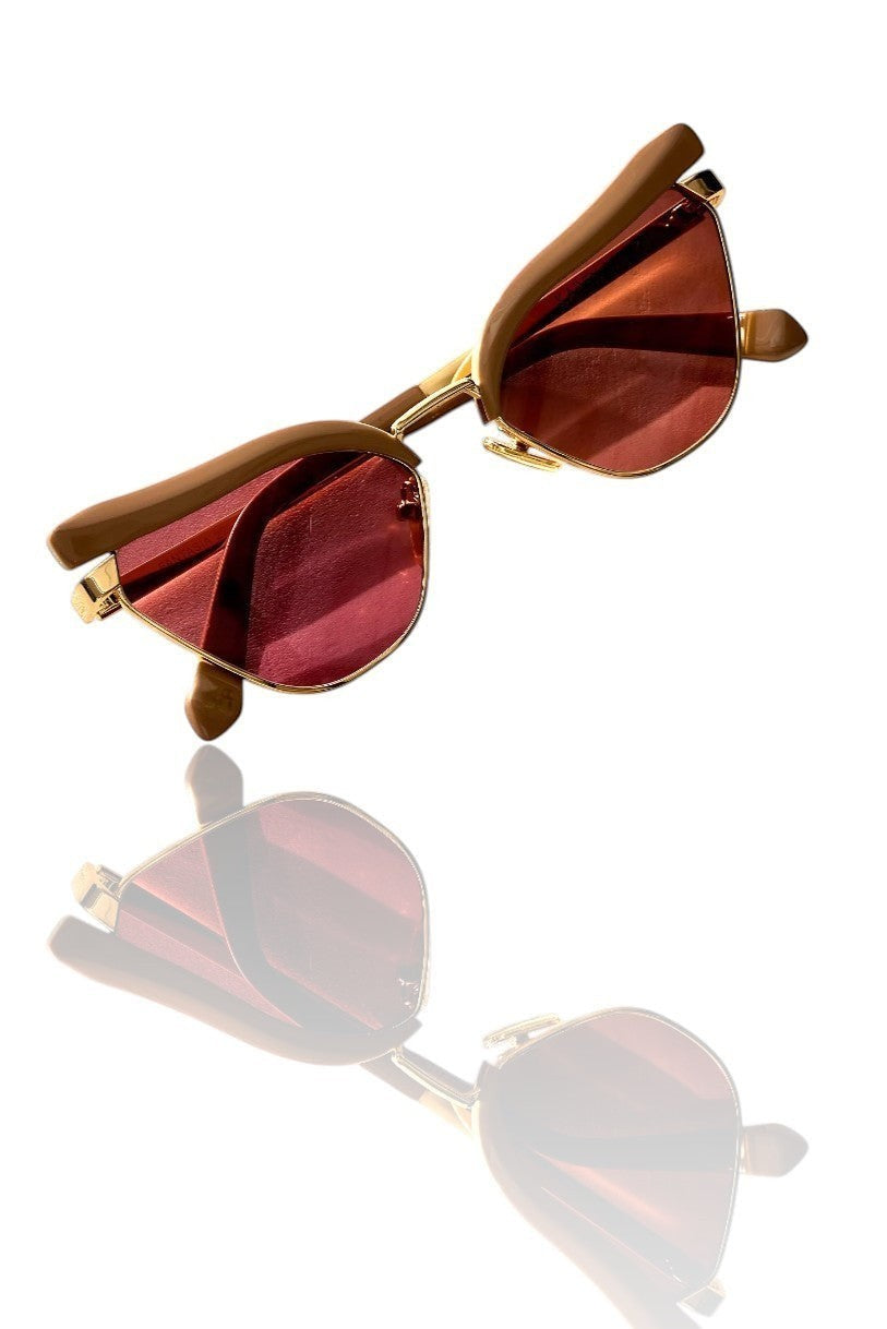 Naked Pear Karen Walker Fantasia cat-eye sunglasses in taupe acetate and gold metal with maroon mono lenses.