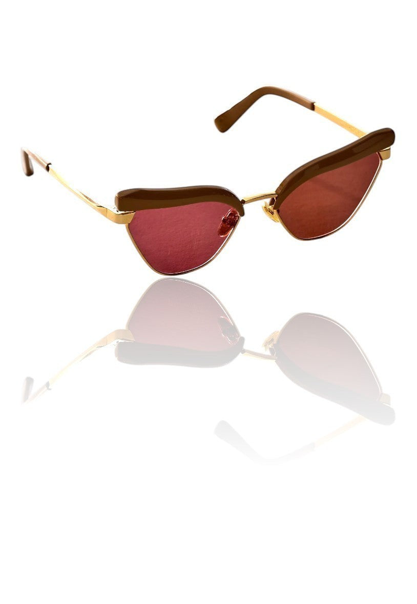 Naked Pear Karen Walker Fantasia cat-eye sunglasses with taupe acetate, gold metal frame, and maroon mono lenses.