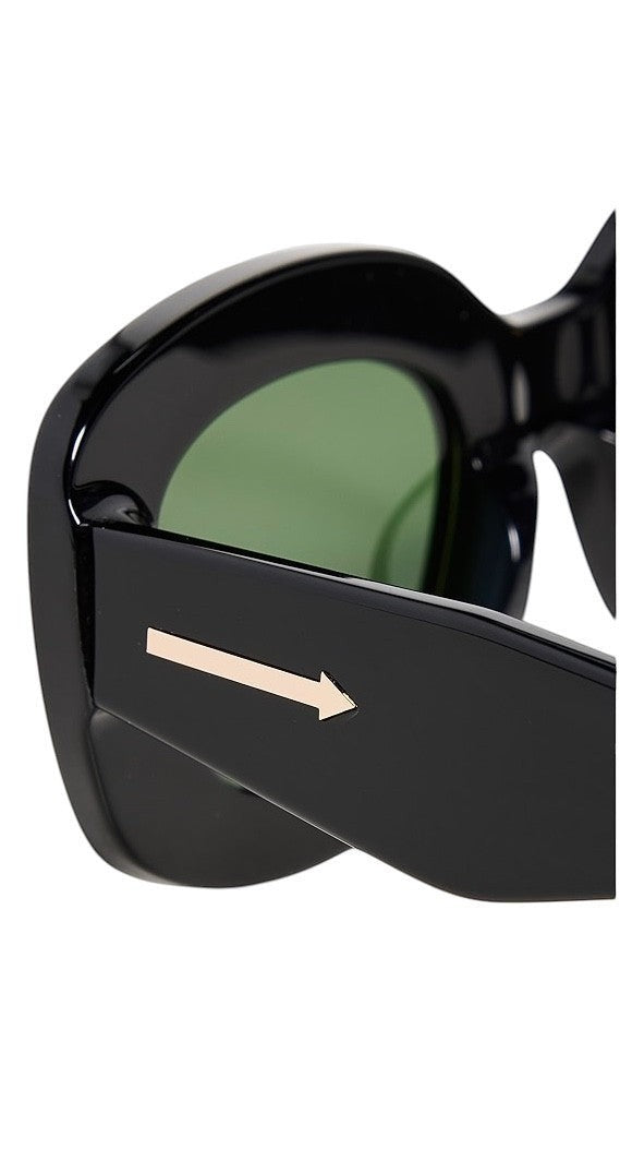 Naked Pear Karen Walker Field Trip sunglasses featuring a black bio-acetate frame and green lenses with arrow detail