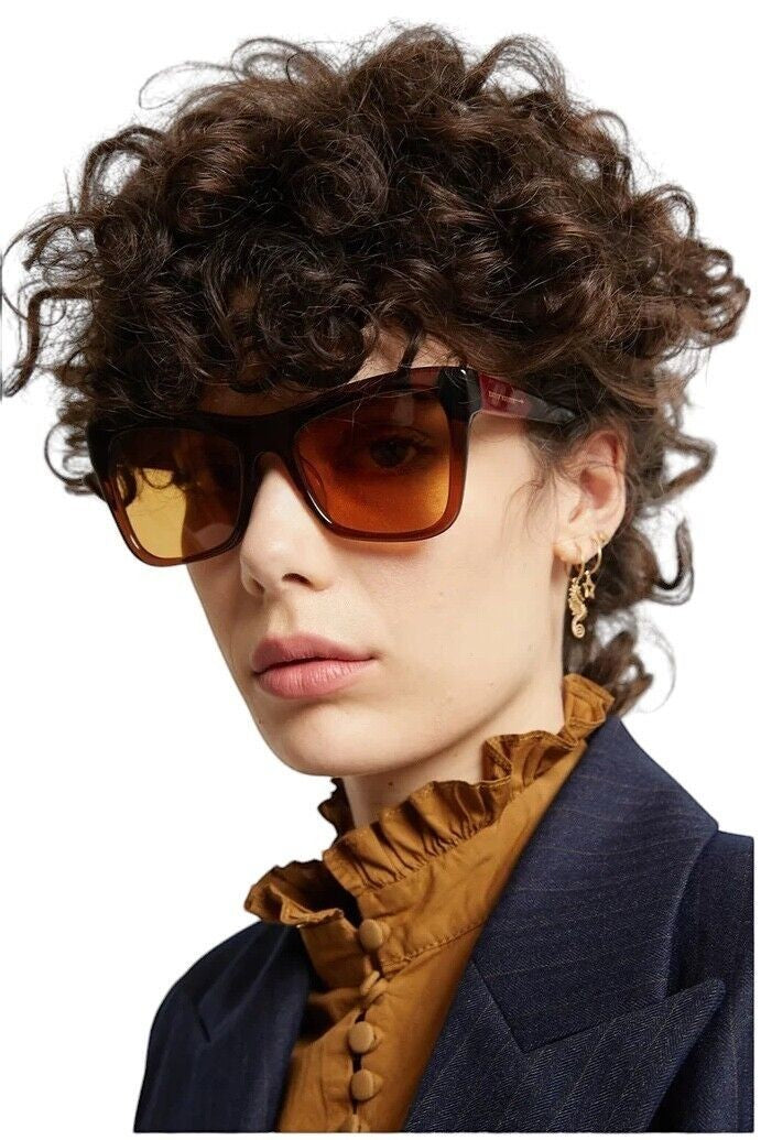 Naked Pear Karen Walker Hallowed cat-eye sunglasses in sepia bio-acetate with brown gradient lenses on a model
