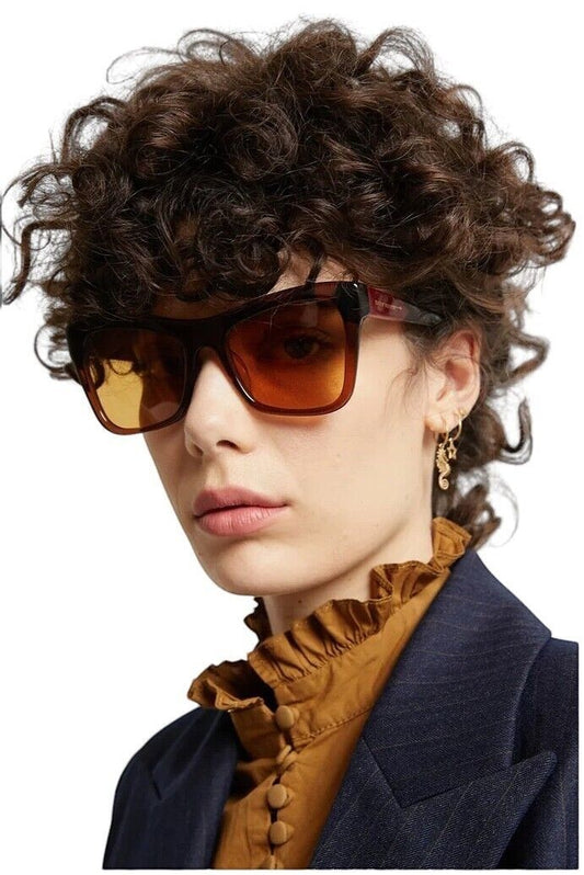 Naked Pear Karen Walker Hallowed cat-eye sunglasses in sepia bio-acetate with brown gradient lenses on a model
