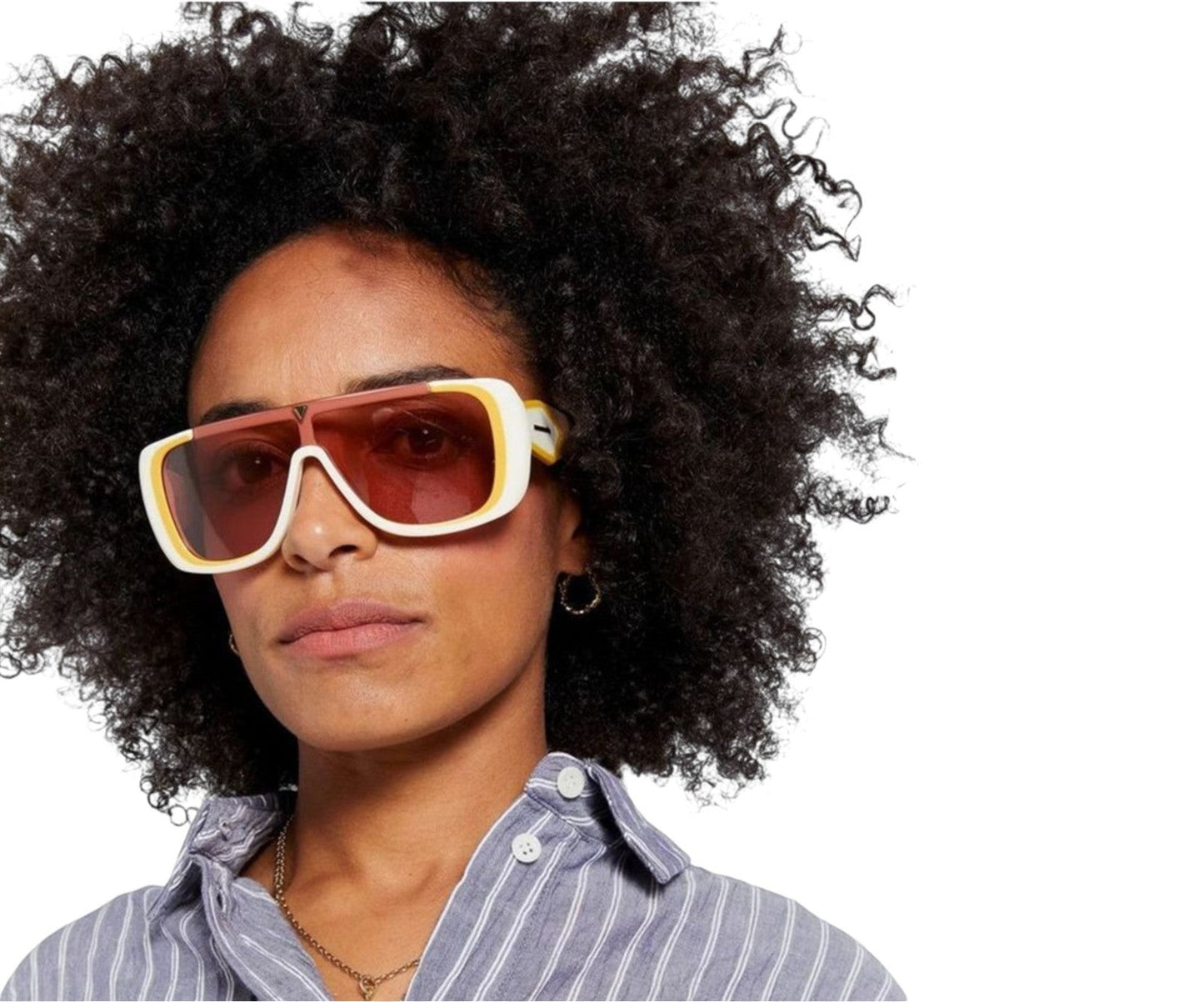 Naked Pear Karen Walker Hexed sunglasses with ivory acetate frame and pink shield lenses worn by a woman