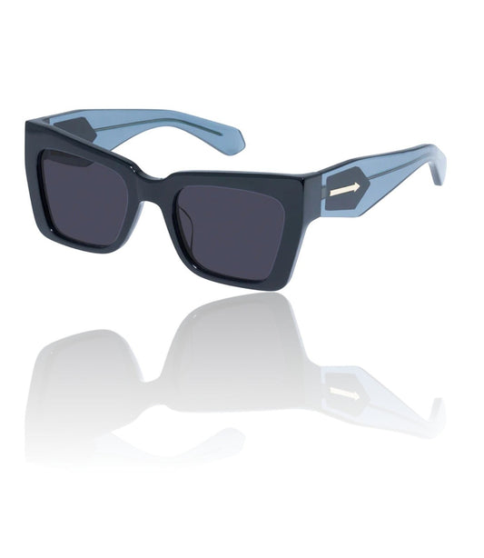 Naked Pear Karen Walker Immortalised sunglasses with black square cat-eye acetate frames, blue arms, and gold arrow detail.